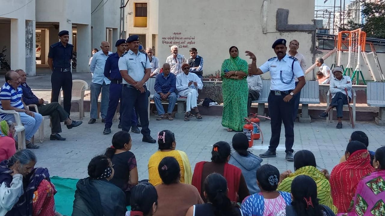 Fire safety training for people living in high rise buildings in Rajkot
